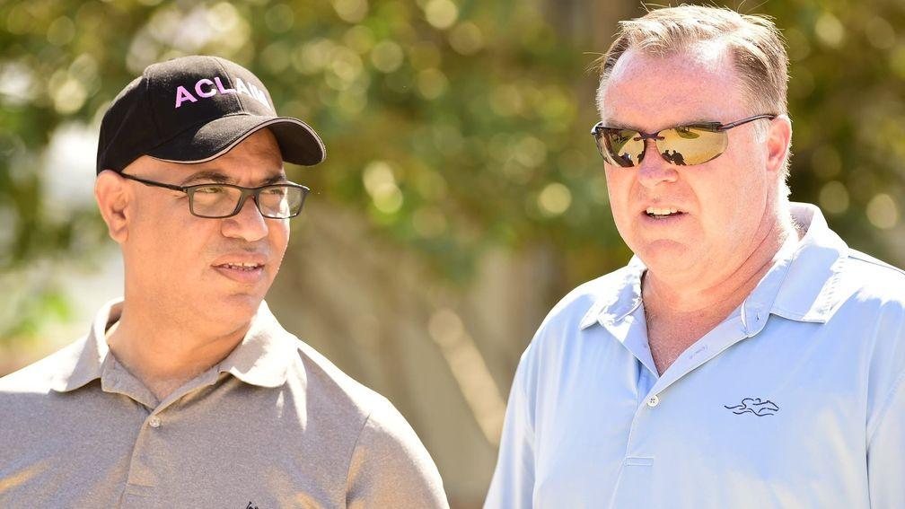 Tom Ludt (right), head of equine operations for Phoenix Thoroughbreds, with Amer Abdulaziz
