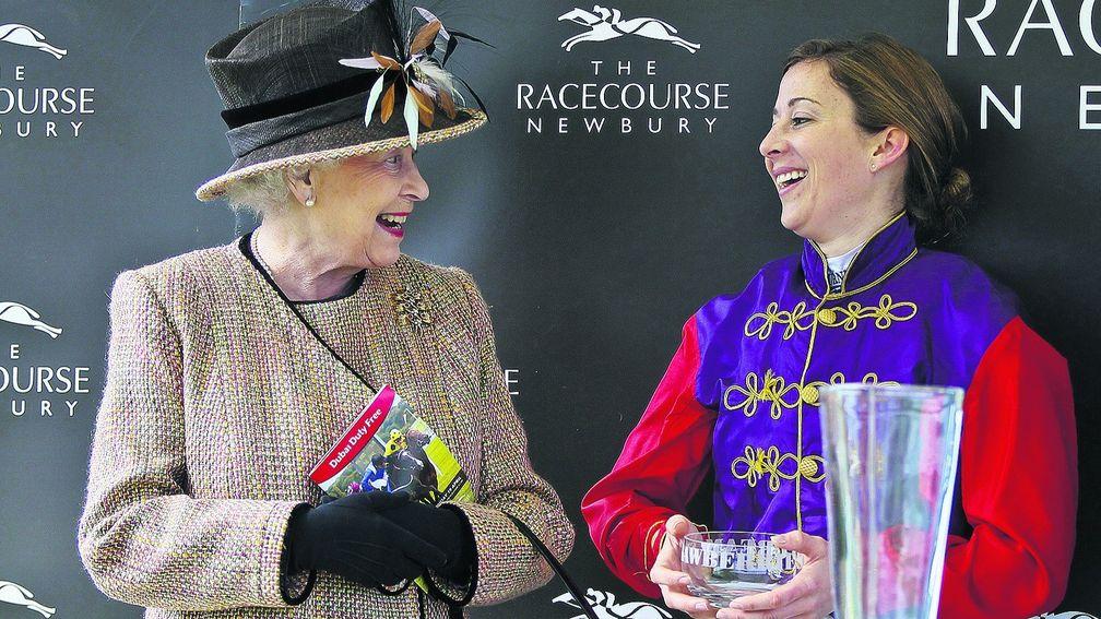 By royal assignment: Hayley Turner meets the Queen after carrying her colours to success at Newbury in April 2013