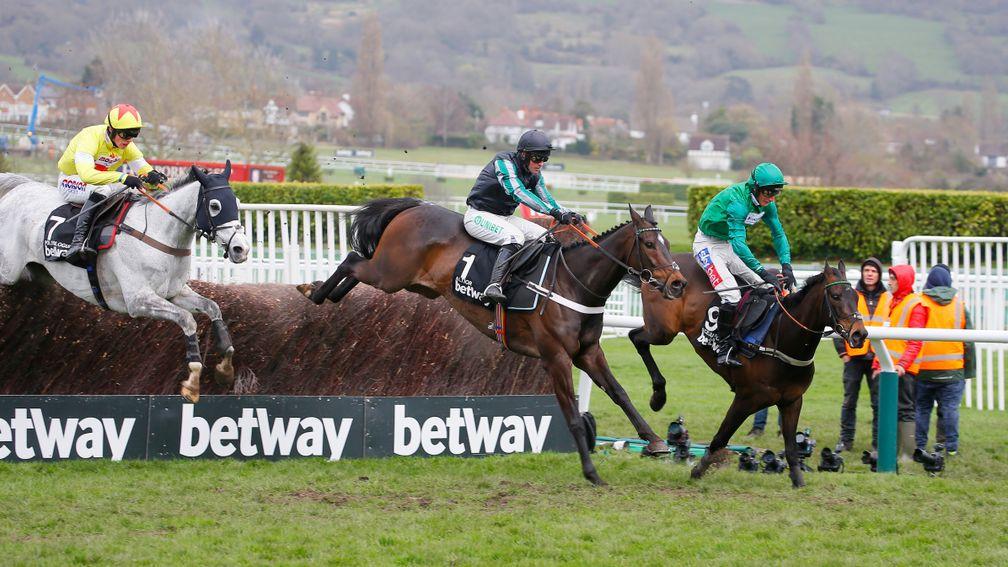 Altior (centre) en route to his second victory in the Champion Chase