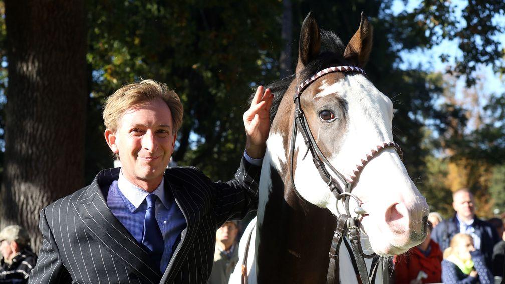 A young Gerhard Schoeningh with Silvery Moon at Hoppegarten