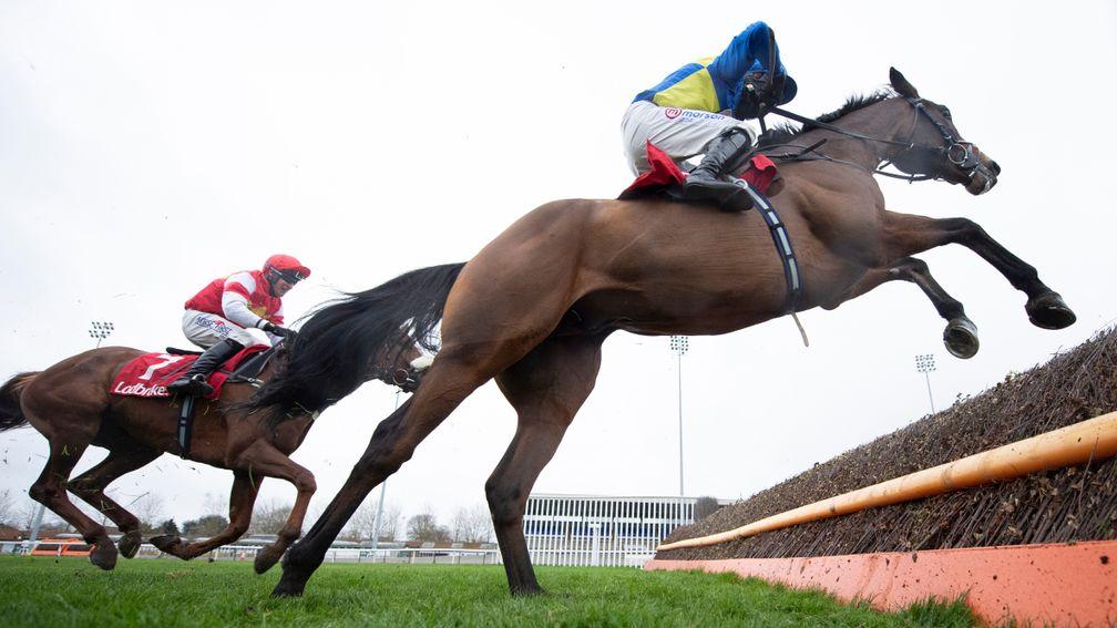 Shan Blue (Harry Skelton) leads over the last fence and beats The Big Breakaway (Robbie Power) in the Kauto Star Novices' ChaseKempton 26.12.20 Pic: Edward Whitaker/Racing Post