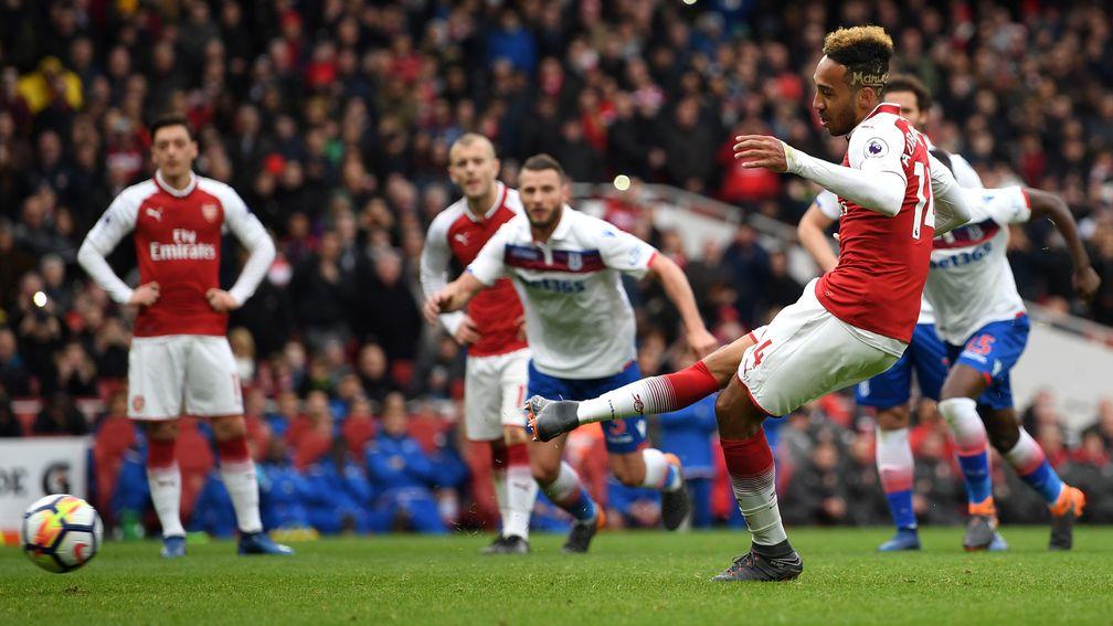 Pierre-Emerick Aubameyang converts a penalty in Arsenal's 3-0 win over Stoke