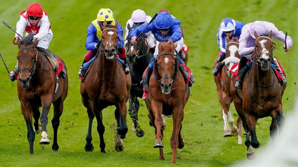 EPSOM, ENGLAND - APRIL 19: William Buick riding Nahanni (blue) win The Cazoo Blue Riband Trial at Epsom Racecourse on April 19, 2022 in Epsom, England. (Photo by Alan Crowhurst/Getty Images)