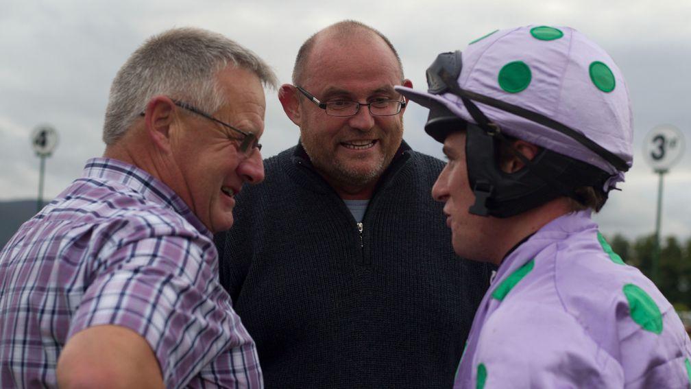 Dr Ronan Tynan (centre) has been involved in breeding horses for most of his life