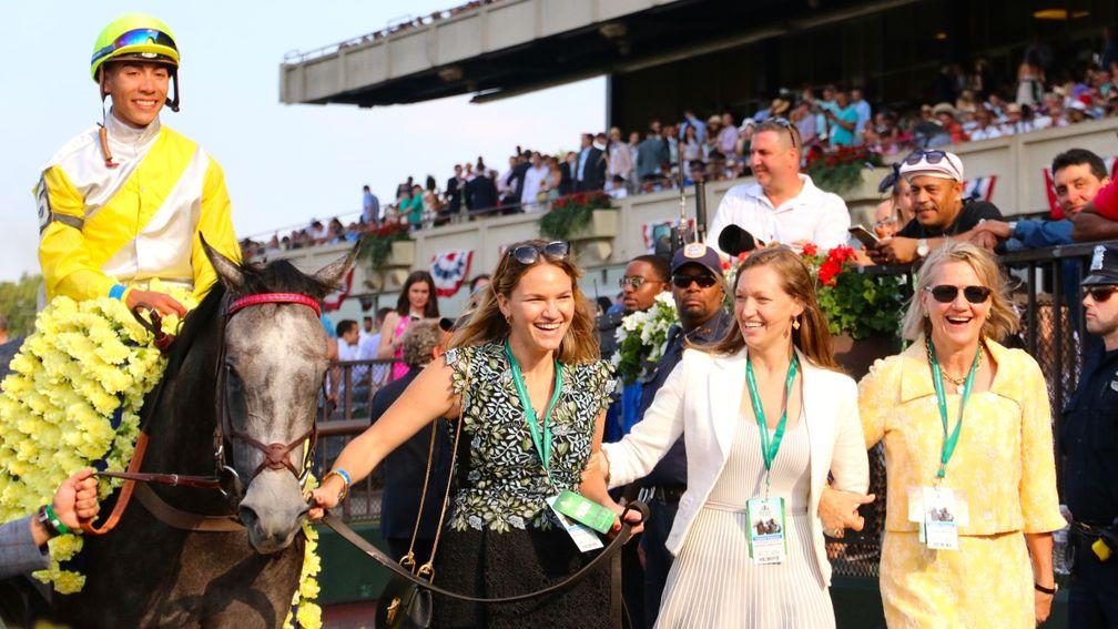 Lynn Hancock (left) leads in Ascend after the 2017 Grade 1 Manhattan Stakes, accompanied by her sister Alex and mother Staci