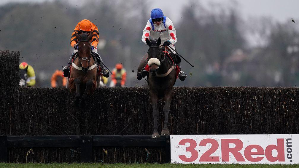Clan Des Obeaux (Harry Cobden, right) jumps the last just ahead of Thistlecrack (Tom Scudamore) in the 32Red King George VI Chase at Kempton on Boxing Day