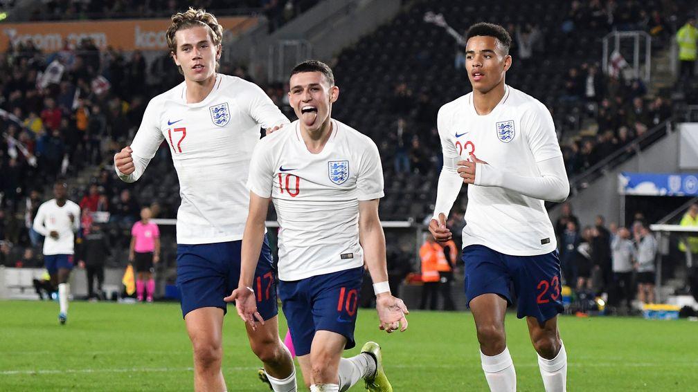 Phil Foden (centre) celebrates scoring during England U21's 2-0 win over Kosovo last month