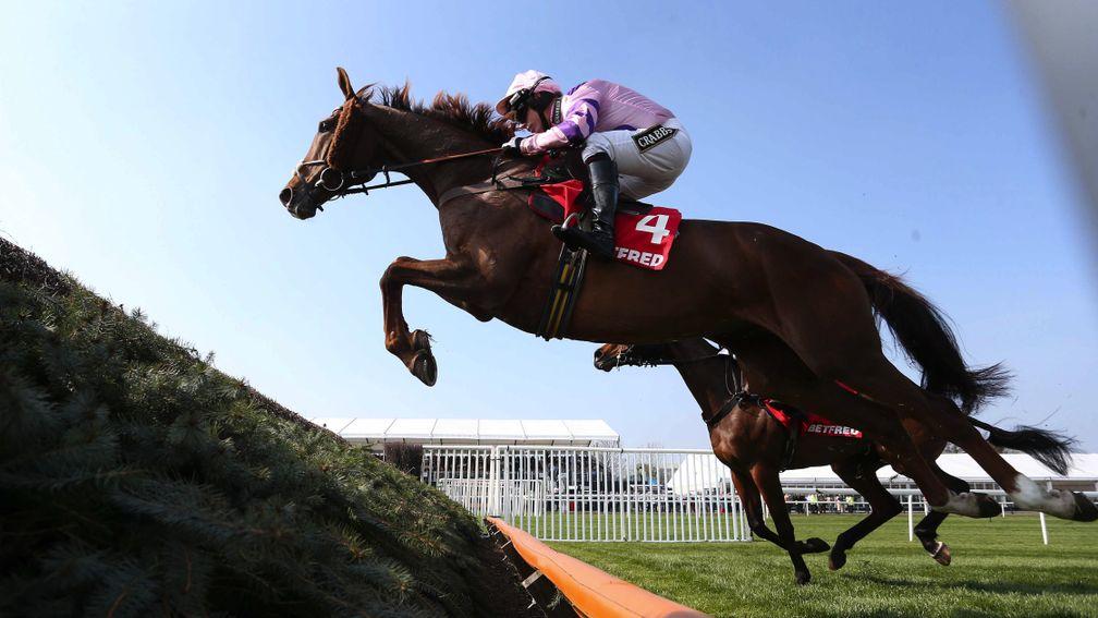 Seeing a stride: Silviniaco Conti puts in another foot-perfect leap on his way to winning a second Aintree Bowl