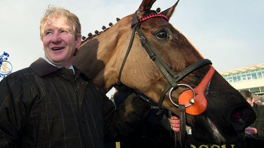 Philip Fenton, with Last Instalment after winning the 2014 Irish Hennessy Gold Cup at Leopardstown, will return to training