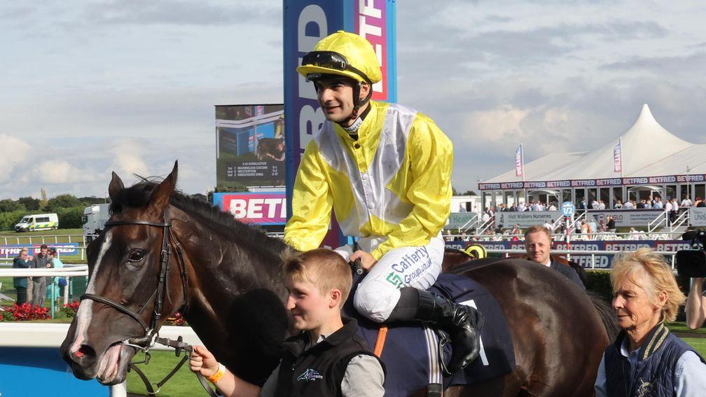 Stefano Cherchi and Maximillion Caesar after victory at the St Leger meeting at Doncaster in September 2023
