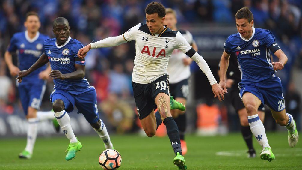 Tottenham's Dele Alli runs at the Chelsea defence