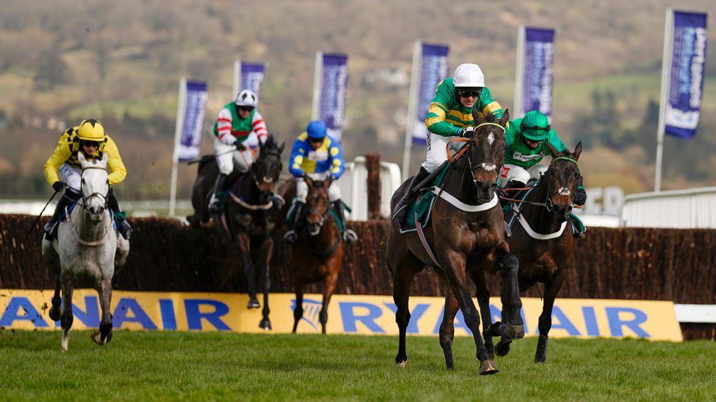 CHELTENHAM, ENGLAND - MARCH 18: Nico de Boinville riding Chantry House (white cap) clear the last to win The Marsh Novices' Chase at Cheltenham Racecourse on March 18, 2021 in Cheltenham, England. Sporting venues around the UK remain under strict restrict