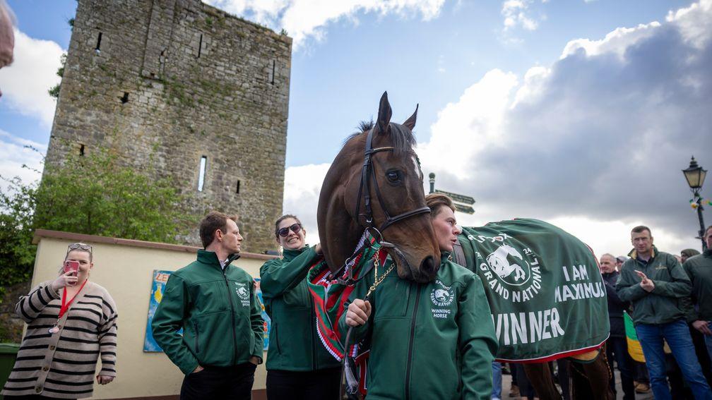 Grand National winner I Am Maximus with groom Steven Cahill as they parade through the local village Leighlinbridge