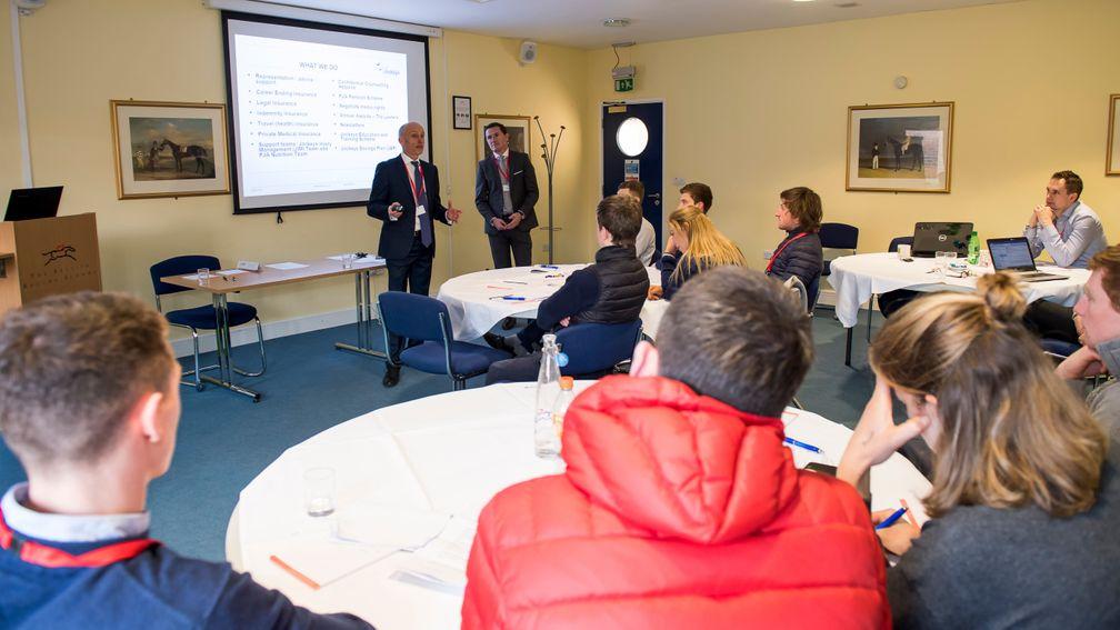 Young jockeys listen to Dale Gibson and Sir Anthony McCoy at one of last year's seminars