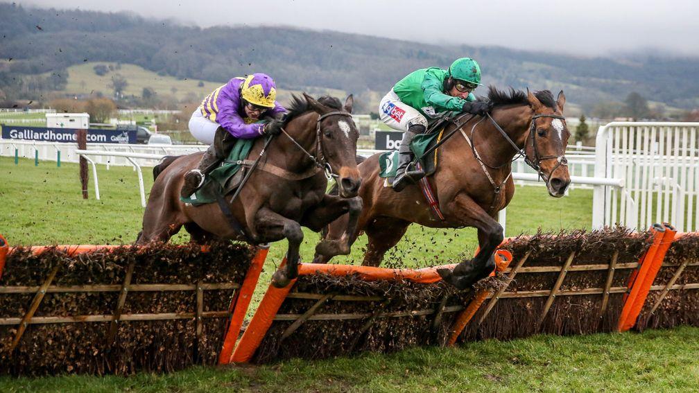 Agrapart jumps the last alongside Wholestone before grinding out victory in the Cleeve Hurdle