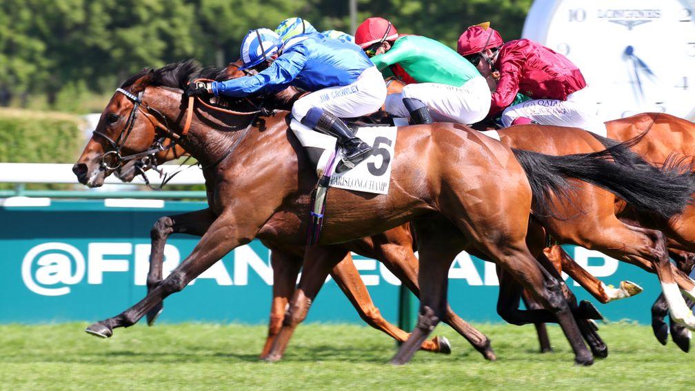Anmaat (blue) edges out his rivals in the Prix d'Ispahan at Longchamp