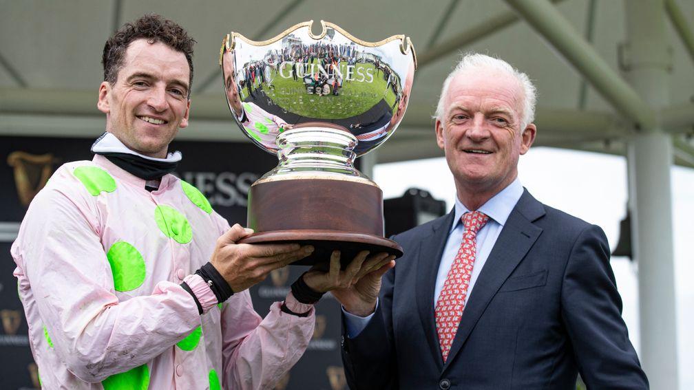 Willie Mullins (right) with son Patrick after the victory of Saldier in the Galway Hurdle