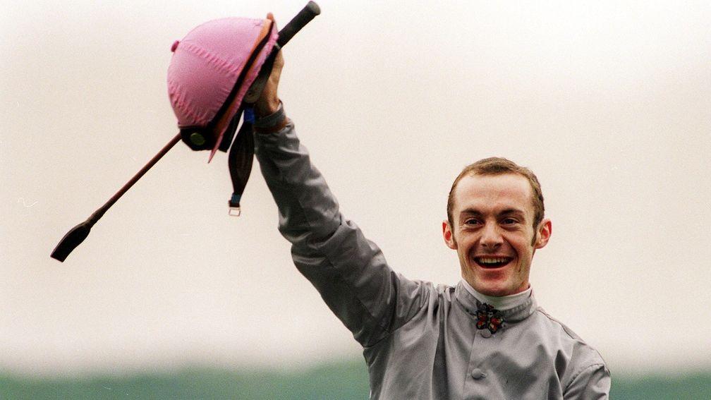 Hat-trick man: Olivier Peslier after winning his third consecutive Prix de l'Arc de Triomphe at Longchamp on Sagamix in 1998