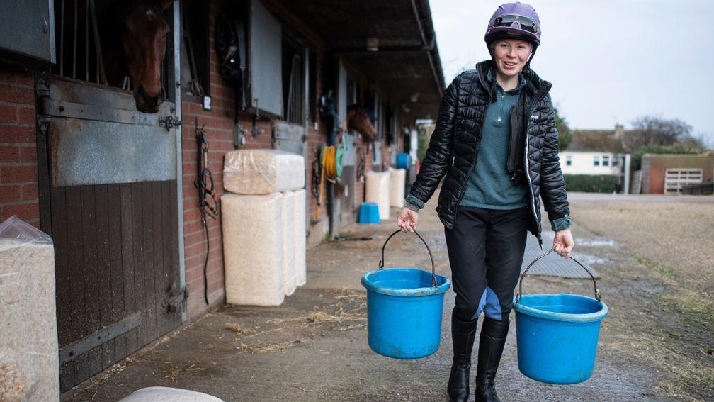 Rosie Margarson, who works for her father George, at Graham Lodge Stables in Newmarket