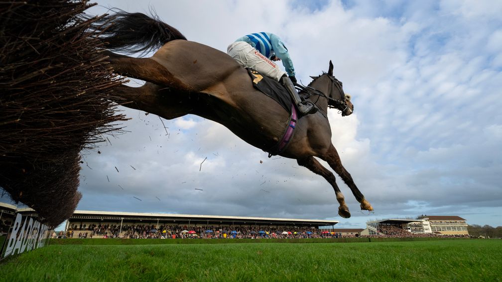 Gustavian and Rex Dingle clear the last fence in the Badger Beers Handicap Chase at Wincanton