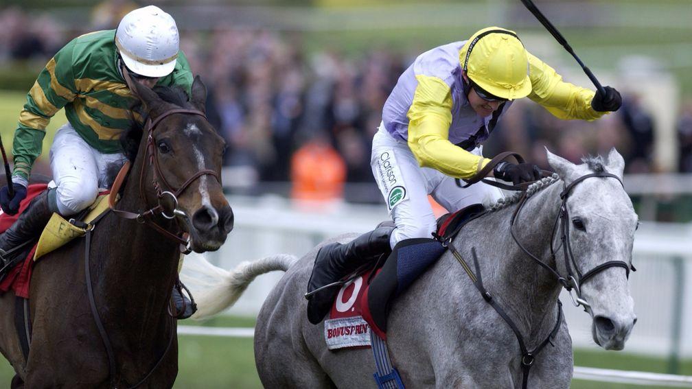Iris's Gift (right) topples the mighty Baracouda in the 2004 Stayers' Hurdle