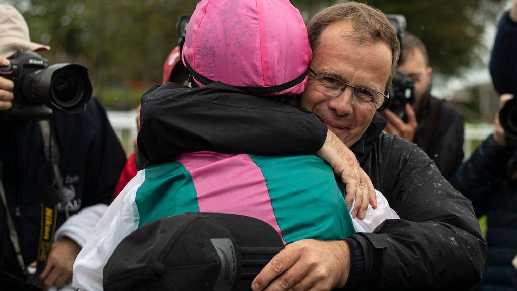Ger Lyons celebrates Siskin's win with his rider Colin Keane after the Keeneland Phoenix Stakes