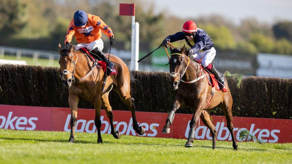 Fastorslow (right) challenges Bravemansgame in the Punchestown Gold Cup