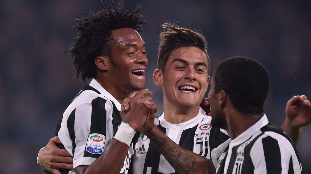 Juan Cuadrado and Juventus celebrate a goal against Spal