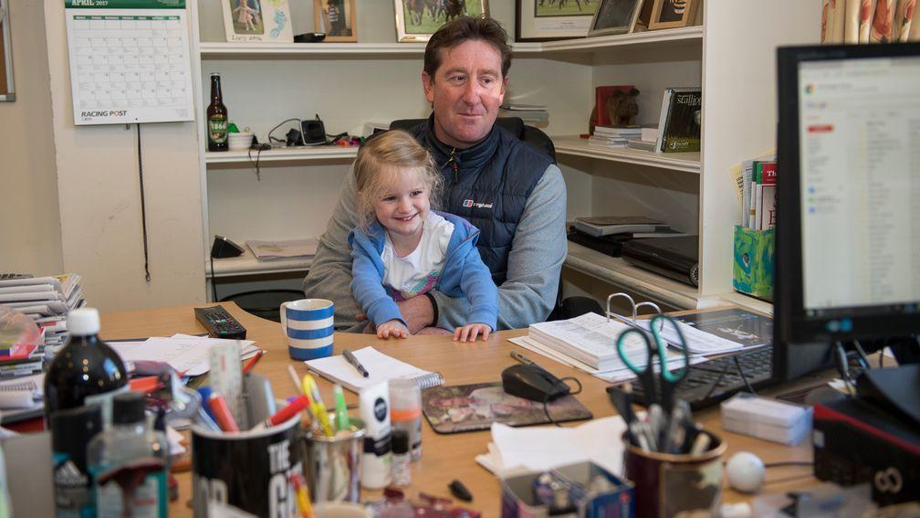 Family atmosphere: David Simcock with his daughter Lucy at his Trillium Place stables in Newmarket