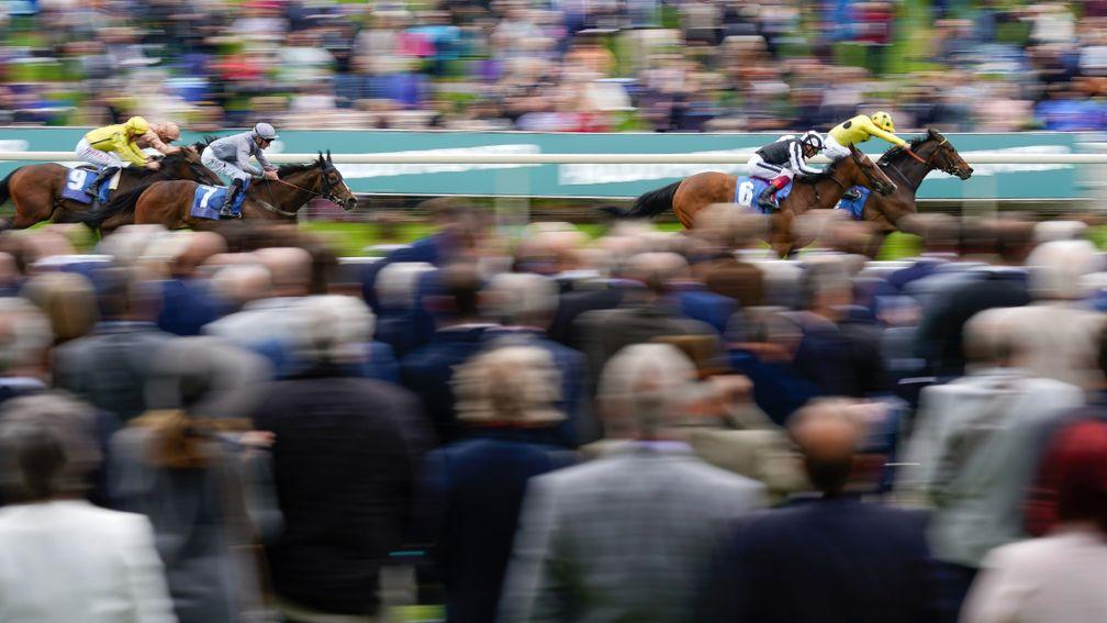 YORK, ENGLAND - MAY 13: Andrea Atzeni riding Fonteyn (R, yellow) win The Oaks Farm Stables Fillies' Stakes at York Racecourse on May 13, 2022 in York, England. (Photo by Alan Crowhurst/Getty Images)