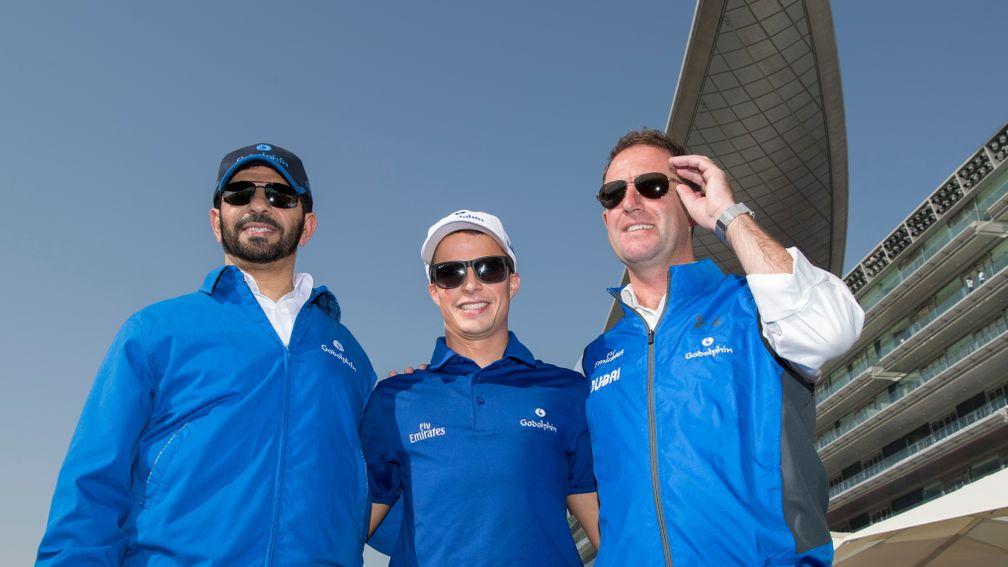Boys in blue: Saeed Bin Suroor (left), William Buick (middle) and Charlie Appleby pose for the cameras