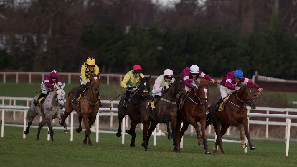 Sharjah (pink cap) travels well into the lead before landing the Ryanair Hurdle at Leopardstown