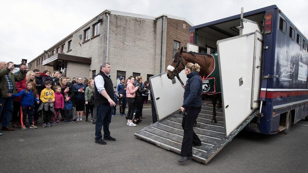 Louise Dunne unloads Grand National winner Tiger Roll at the community centre before parading up the main street of Summerhill
