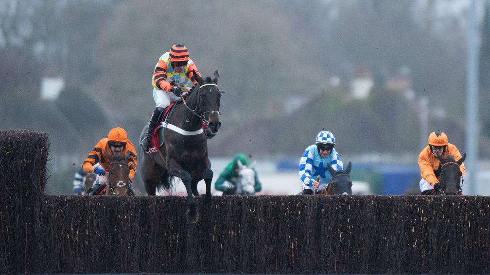 Might Bite (Nico de Boinville) jumps the last fence and wins the King George VI ChaseKempton 26.12.17 Pic: Edward Whitaker