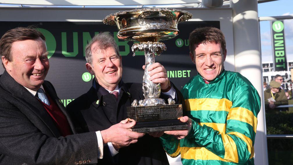 Champion trio: trainer Nicky Henderson (left), owner JP McManus and rider Barry Geraghty with the Champion Hurdle Trophy after Buveur D'Air's success