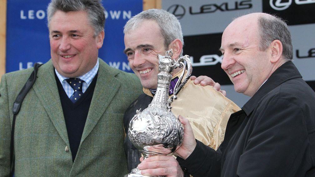 Graham Wylie (right) with Paul Nicholls and Ruby Walsh (centre) at the Lexus Chase trophy presentation