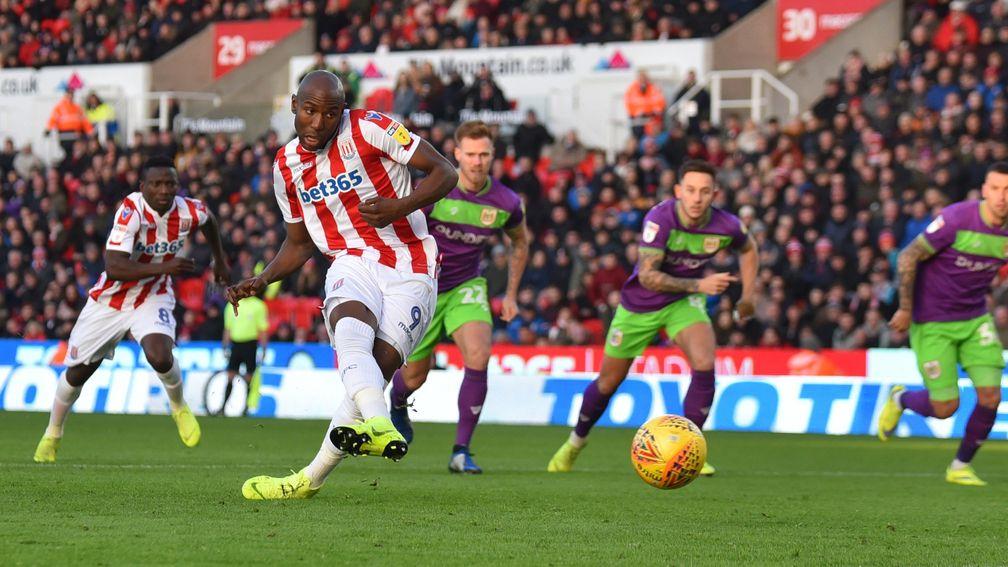 Benik Afobe strokes home a penalty for Stoke last season