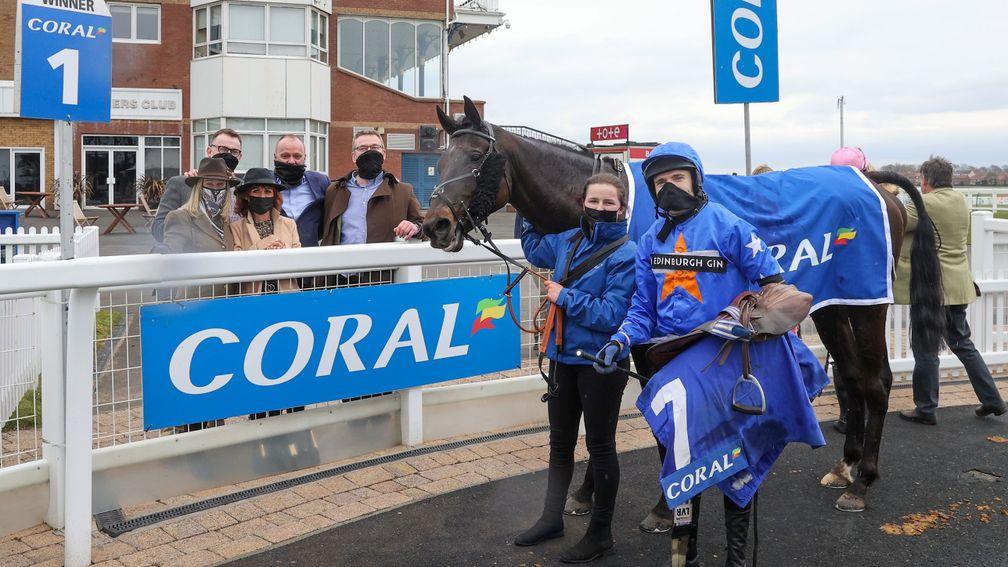 National heroes: Tom Scudamore poses with Mighty Thunder after victory in the Scottish Grand National