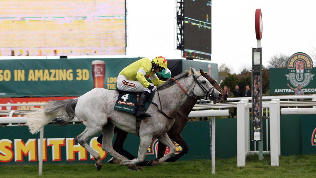 Neptune Collonges (nearside) just gets up to win the 2012 Grand National for Paul Nicholls