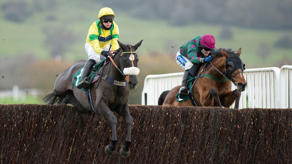 Happygolucky (David Bass,left) jumps the 2nd last fence and beats  Hold The Note in the 3m 1f novicesâ chaseCheltenham 11.12.20 Pic: Edward Whitaker/Racing Post
