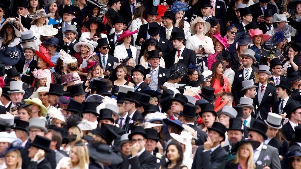 ASCOT, ENGLAND - JUNE 18: Part of the crowd watch the carriage procession during Day Five of Royal Ascot at Ascot Racecourse on June 18, 2016 in Ascot, England. (Photo by Julian Herbert/Getty Images)