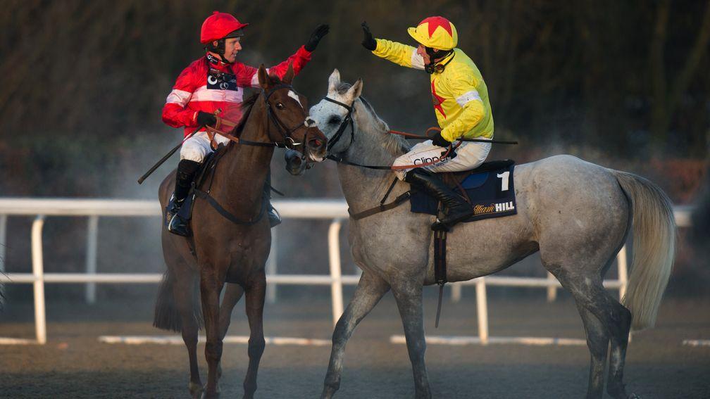 Job well done: Noel Fehily receives a high-ﬁve from Al Ferof’s rider Daryl Jacob after Silviniaco Conti's victory in the 2013 King George VI Chase