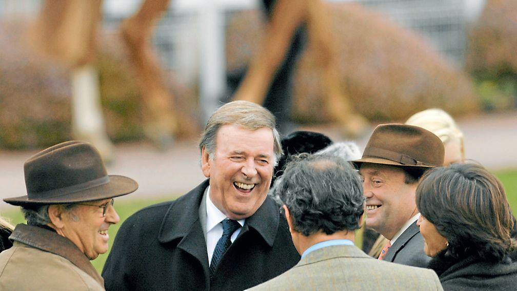 Sir Terry Wogan, pictured sharing a joke with trainer Nicky Henderson (right in trilby) before Wogan finished fifth at Sandown in 2006, died in January