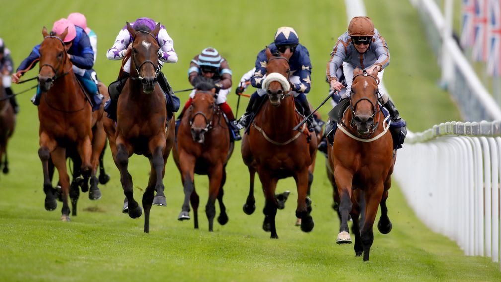 Caradoc (out of shot) ran a smart race when sixth to Sky Defender (rail) in the Investec Handicap on Derby day