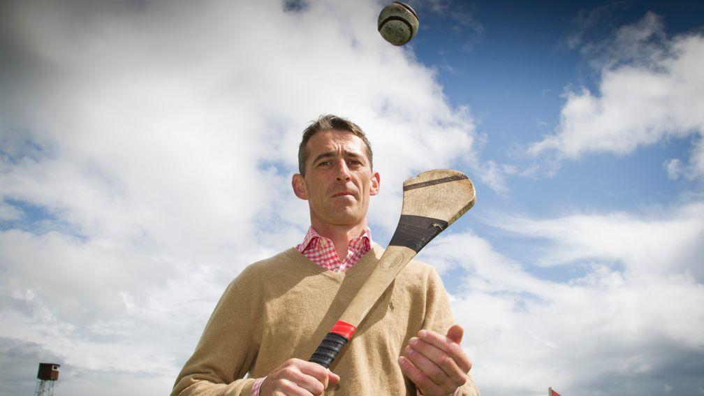Jockey Davy Russell and ex minor hurler James Dowling promoting the annual Hurling For Cancer charity event Galway Festival Photo: Patrick McCann 28.07.2015