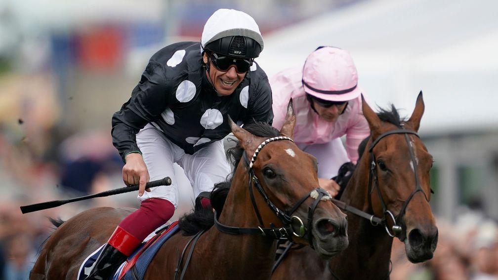 EPSOM, ENGLAND - MAY 31: Frankie Dettori riding Anapurna (black) win The Investec Oaks from Pink Dogwood (purple) at Epsom Racecourse on May 31, 2019 in Epsom, England. (Photo by Alan Crowhurst/Getty Images)