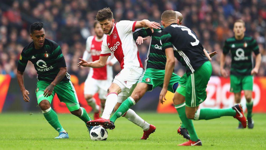 Klaas-Jan Huntelaar of Ajax battles with Renato Tapia and Karim El Ahmadi of Feyenoord