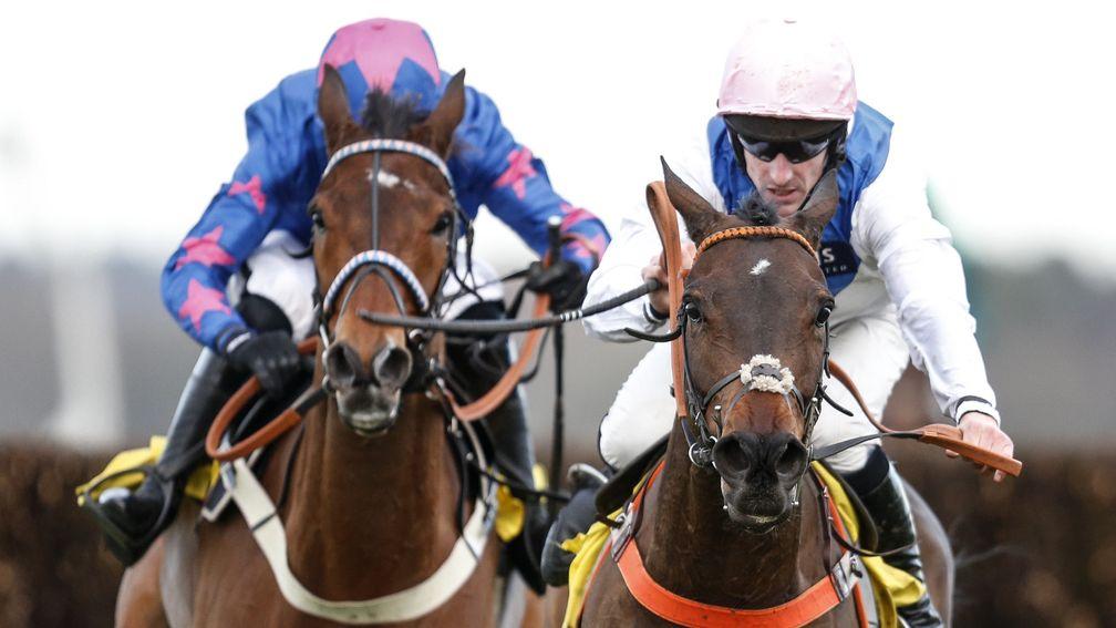 Waiting Patiently (right) sees off the attentions of veteran star Cue Card in a thrilling Ascot Chase