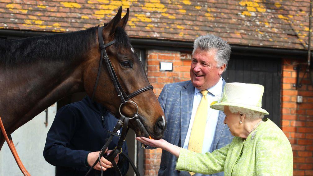 The Queen enjoys some time with Frodon during her visit to Paul Nicholls' Manor Farm Stables in March 2019