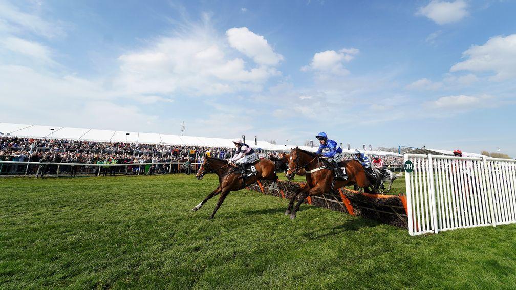 Reserve Tank (blue) en route to victory in the Betway Mersey Novices' Hurdle on Grand National Day at Aintree